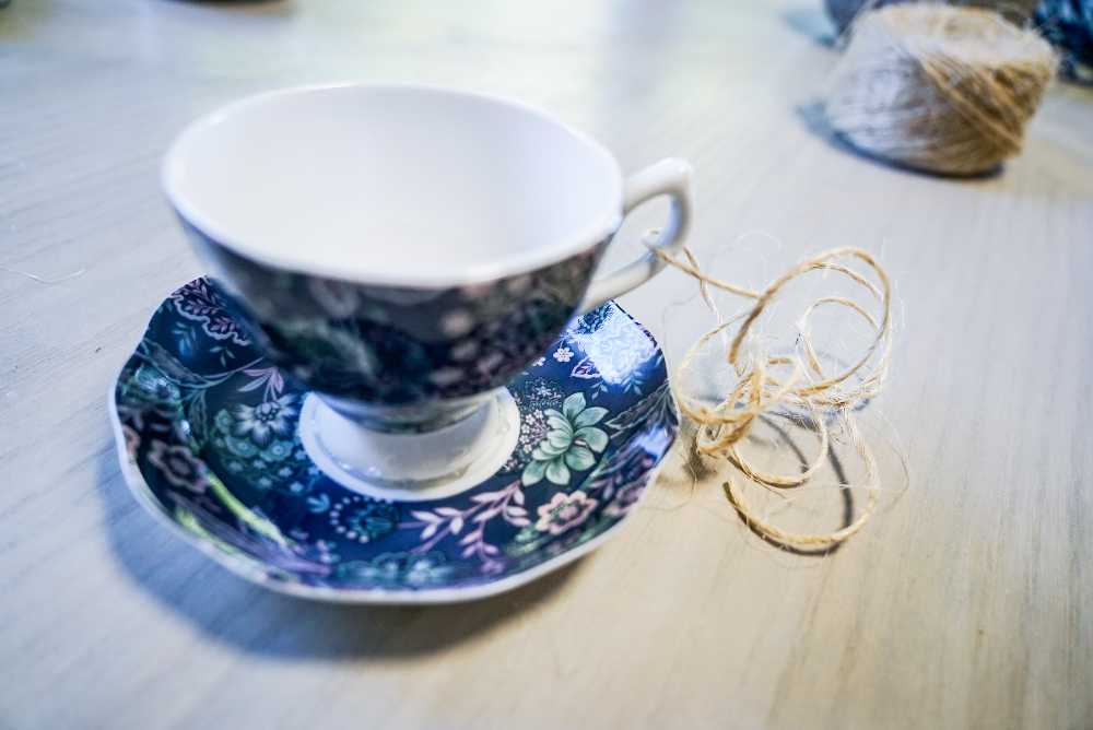 teacup and saucer with twine